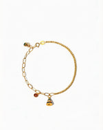 Elegant 18K gold bracelet for women with jadeite links and enamel beads, handcrafted in Nepal.