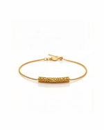 Handcrafted 18k solid gold bracelets for women with bold, rich design and pure gold craftsmanship from Nepal and North America