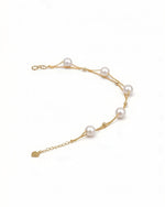 Double-layer Akoya pearl bracelet with solid 18K gold beads and round ocean pearls