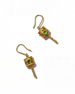 Hollow rotating cylinder earrings in 18K gold with intricate new Chinese style design.