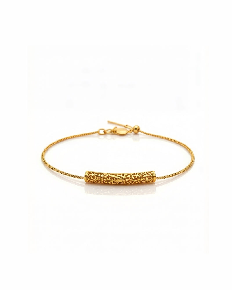 18K gold bracelet with a sculpted horn-of-plenty (cornucopia) charm