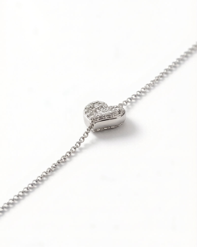 Detail of a long Akoya pearl and double-sided diamond necklace