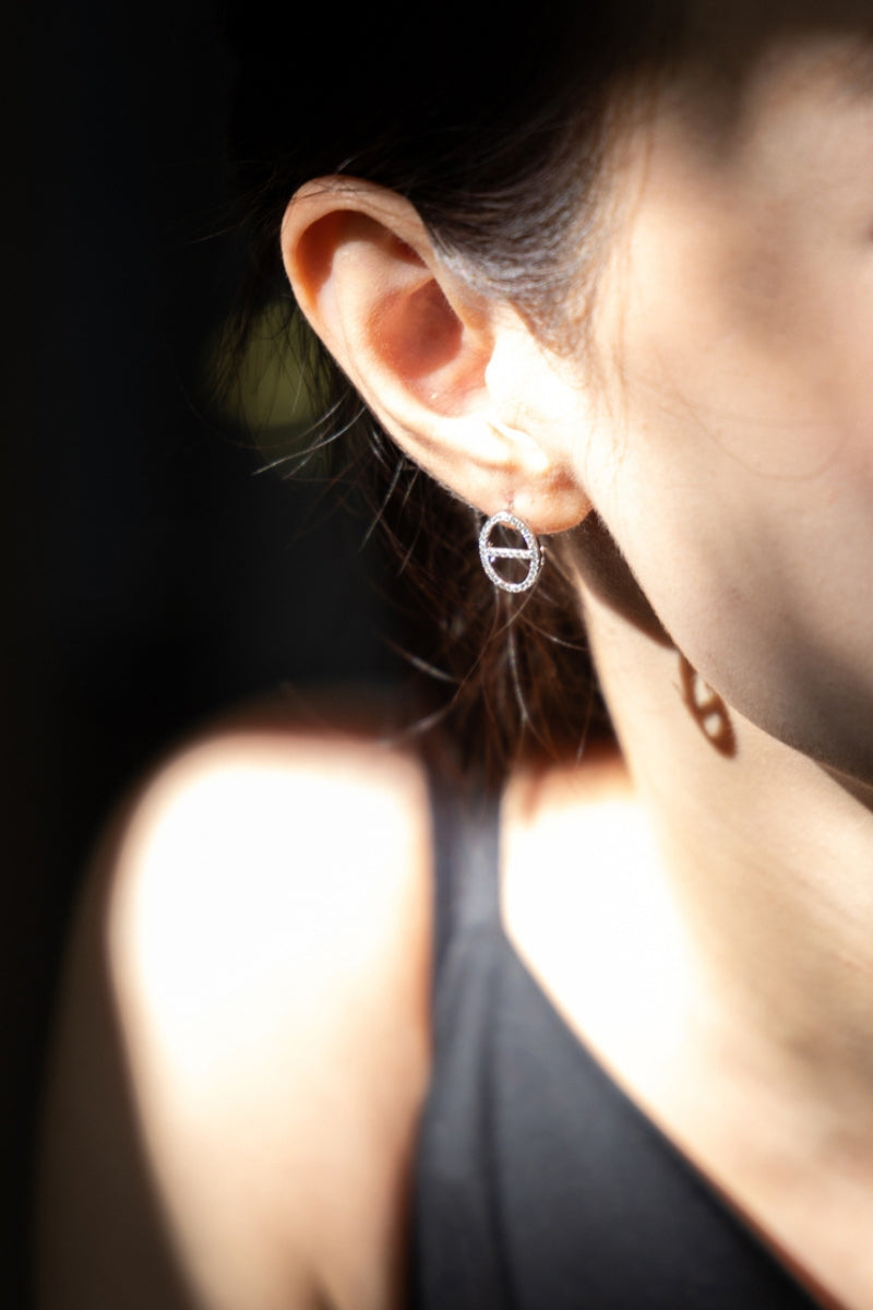 White gold diamond link earrings shown in stud and drop configurations