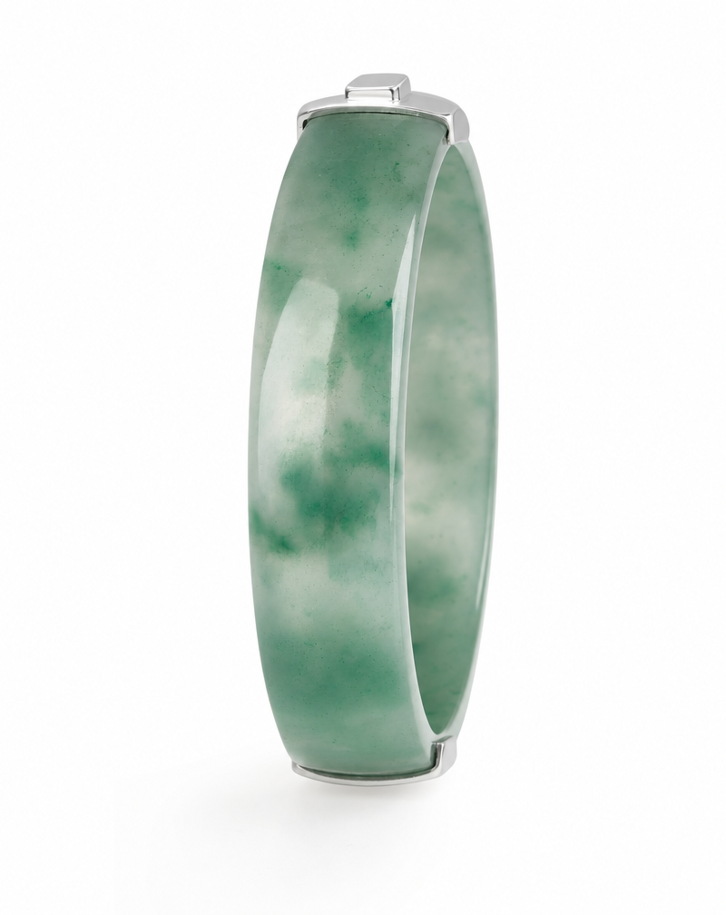 Green African jade Art Deco bangle with geometric square-cut detailing in sterling silver and an 18K white gold finish