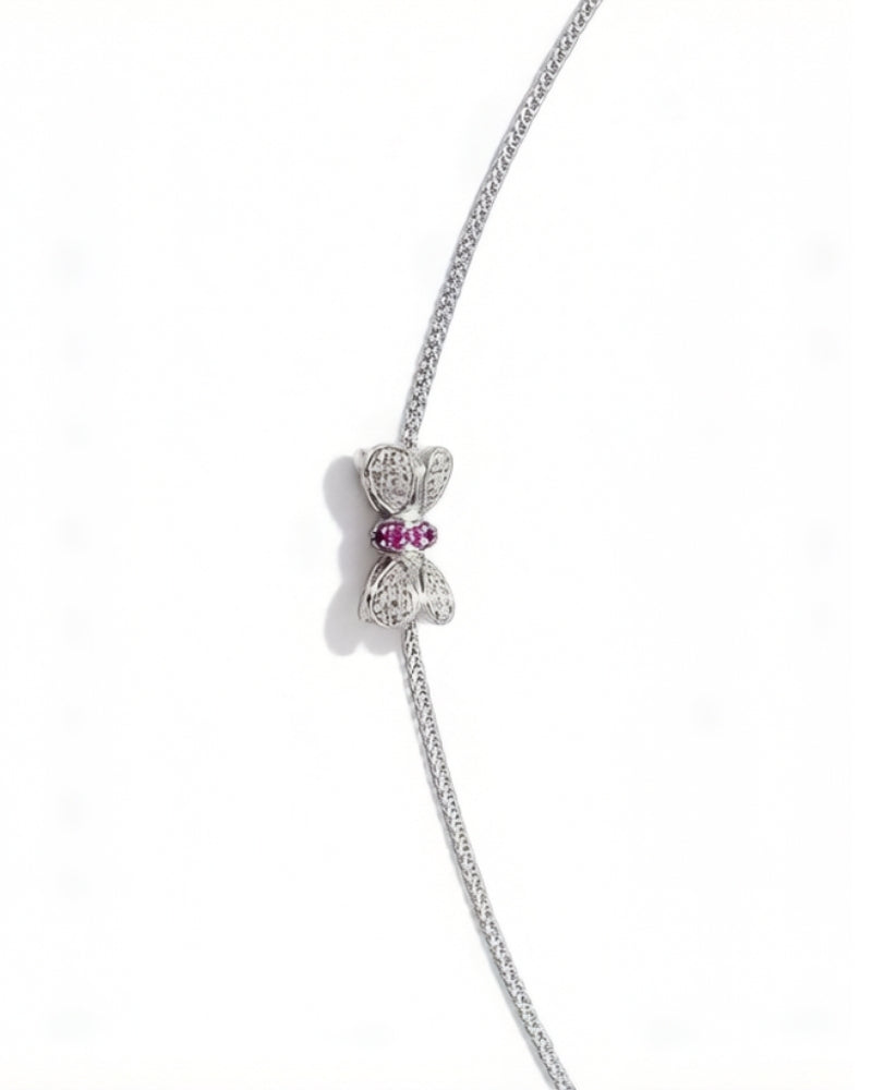 Diamond ribbon bow pendant necklace in 18K white gold