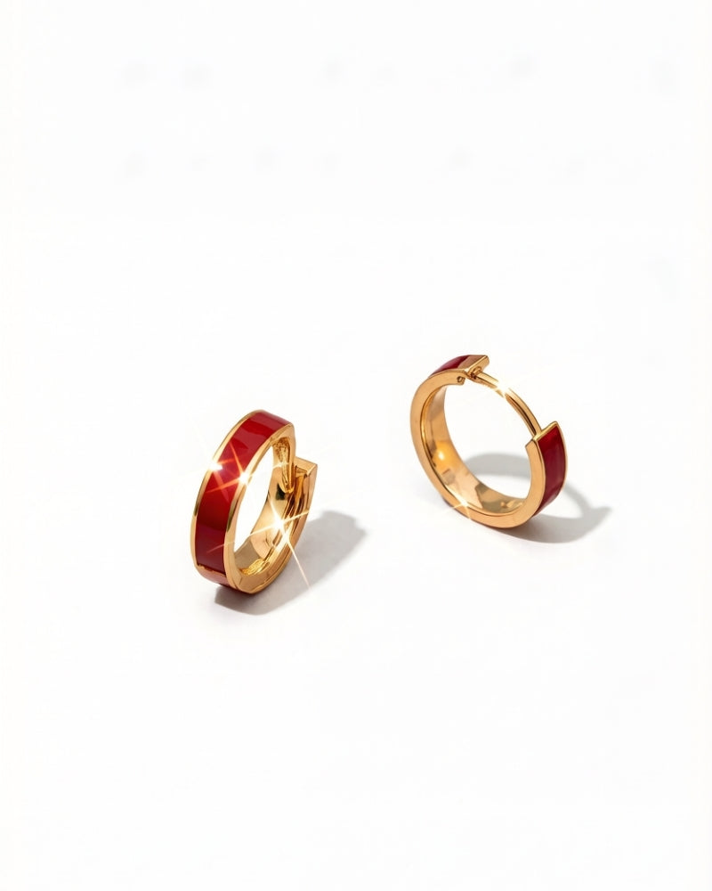 Compact 14K gold hoop earrings with a burgundy enamel finish