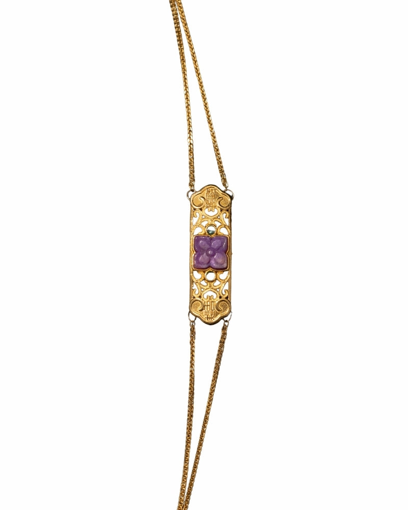 Amethyst bar gold bracelet with intricate carvings and purple-gold design