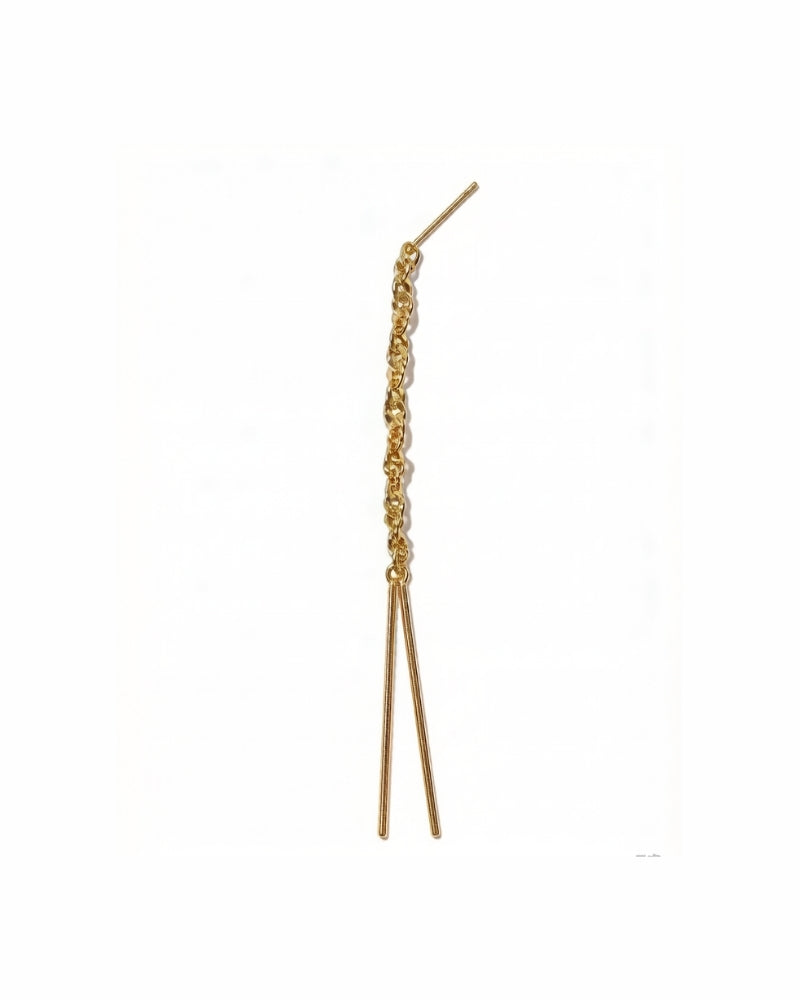 Long gold tassel earring handcrafted in Venice, Italy, with dual-tone fringe and 14K flame-kissed gold design.