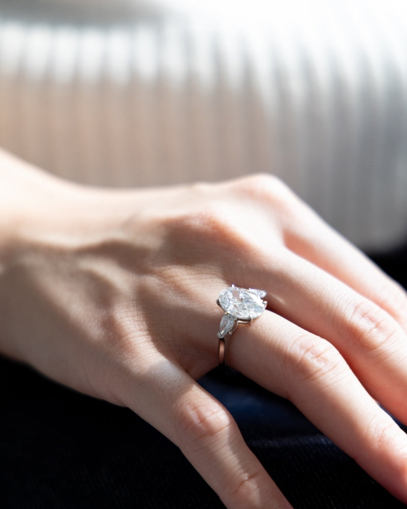 Pigeon Egg Oval Diamond Ring styled — diamond ring showcase by TEASES