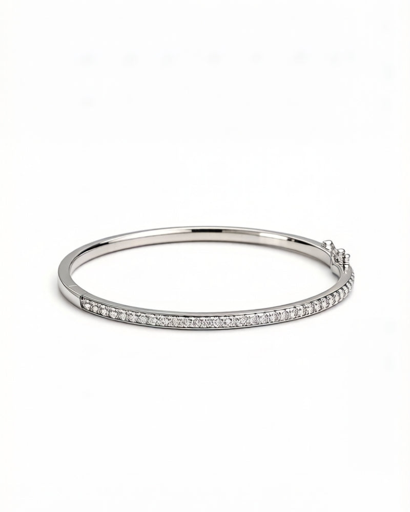 Oval stackable diamond bracelet with 1.03 carat pave set S1-grade white diamonds in 14K white gold double clasp design