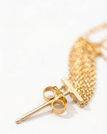 Two-Tone Gold Tassel Earrings - close-up | TEASES Fine Jewelry