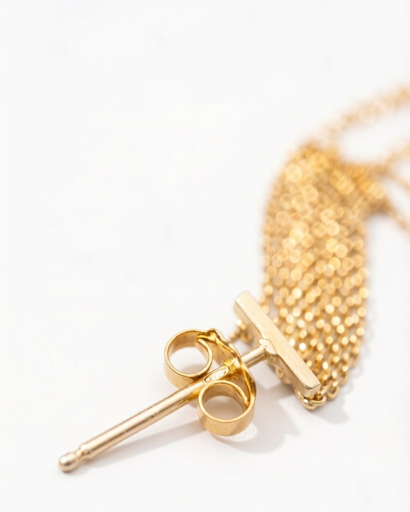 Two-Tone Gold Tassel Earrings - close-up | TEASES Fine Jewelry