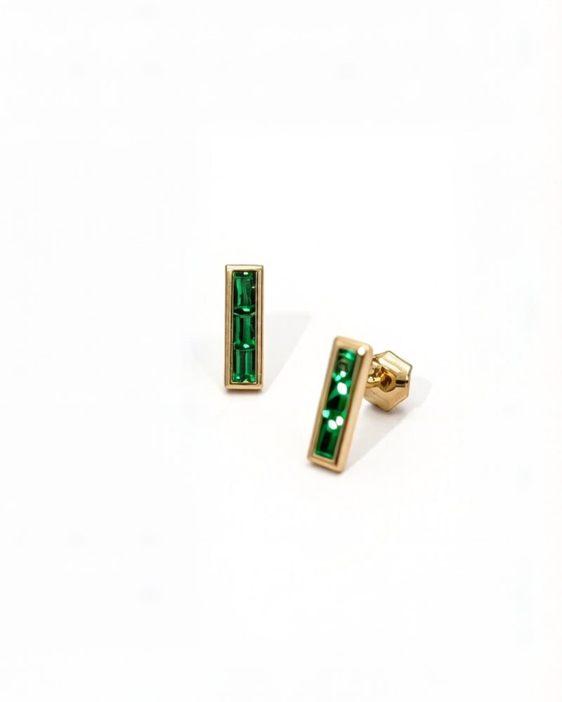 Emerald bamboo drop earrings in 14K gold showcasing deep green brilliance and elegant craftsmanship.