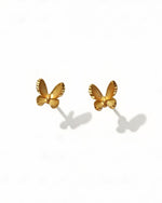 Butterfly sparkling earrings in 18K gold from Free and Elegant Collection, day and night wear, authentic Teases hallmark.