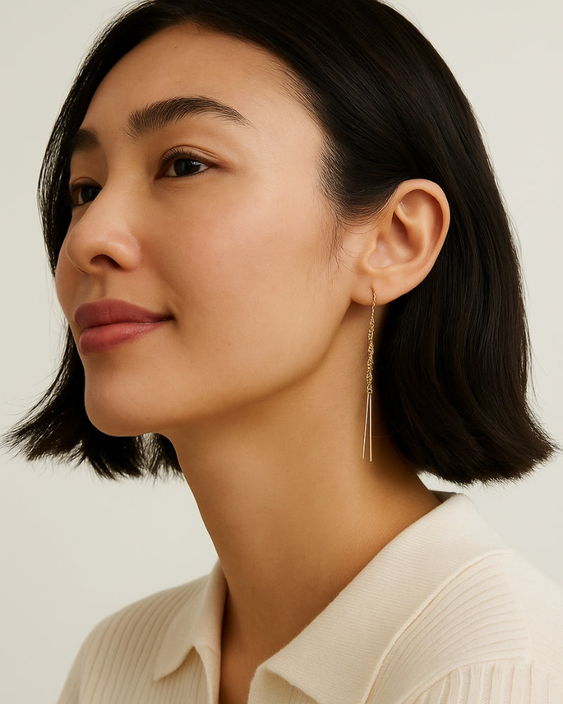 Long gold tassel earring handcrafted in Venice, Italy with 14K gold and dual-tone fringe design.