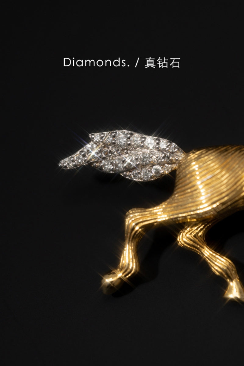 Detailed view of diamond-encrusted gold setting on TEASES vintage brooch-pendant